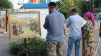 Передвижная выставка "Герои, живущие в веках" прошла в парке Материнской Славы 